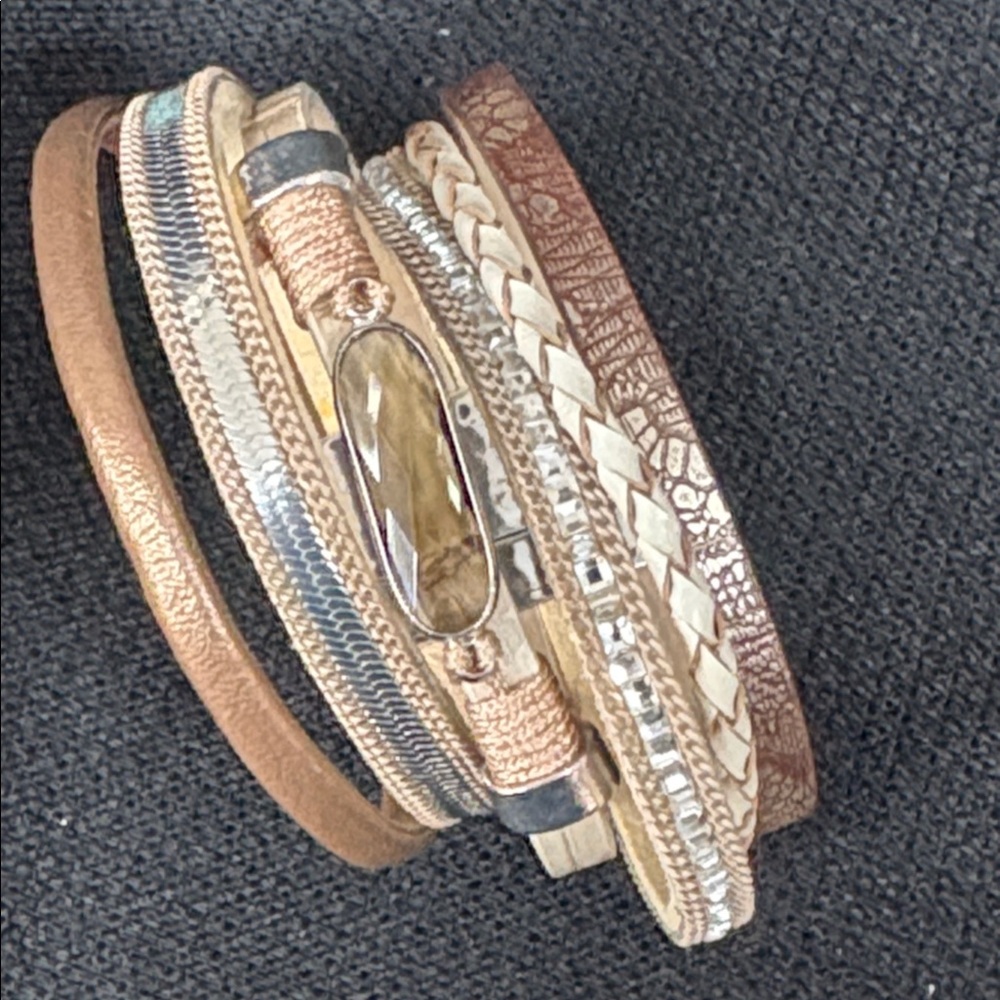 Elegant Multi-Layered Bracelet with Gold and Silver Accents